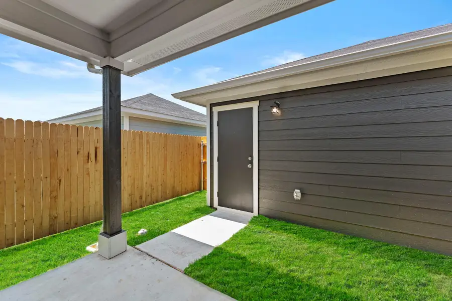 Exterior details and patio area of a home in Valverde, Bastrop (Image 4).