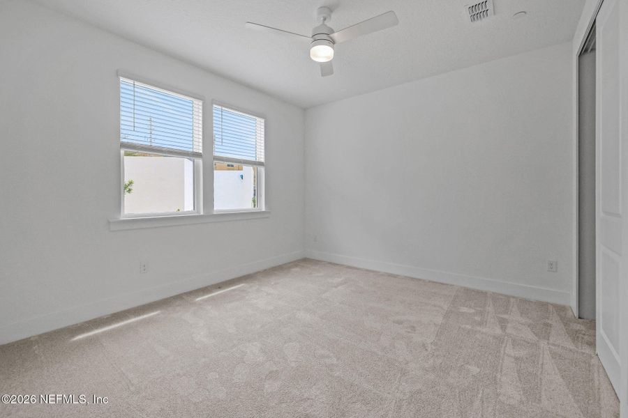 Spacious, unfurnished interior of a new home in North Beach Townhomes, Jacksonville Beach (Image 19).