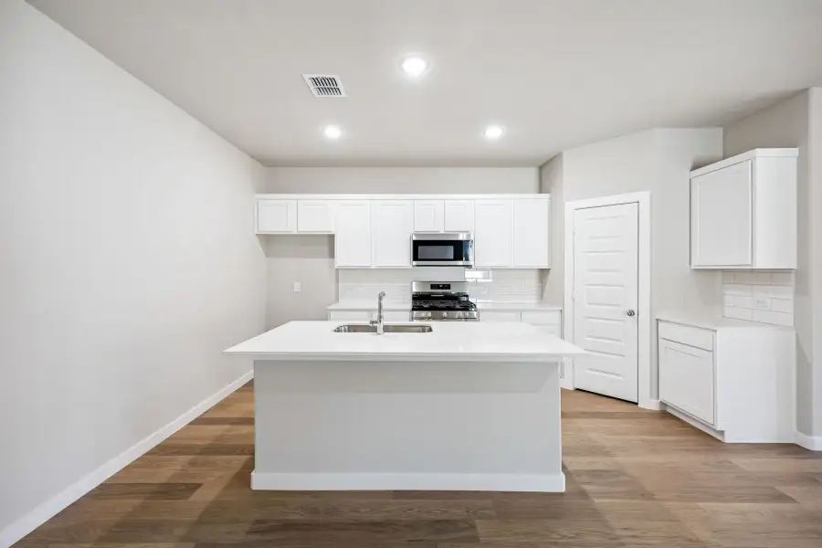 Kitchen in the Willow home plan by Trophy Signature Homes – REPRESENTATIVE PHOTO Kitchen in the Willow home plan by Trophy Signature Homes – REPRESENTATIVE PHOTO