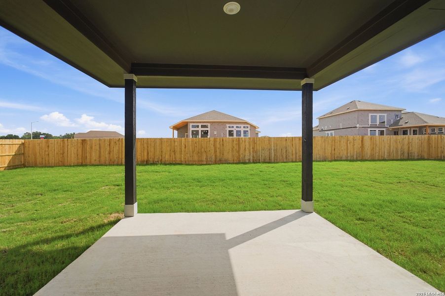 Exterior details and patio area of a home in Hickory Ridge, Elmendorf (Image 21).