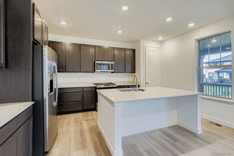 Furnished interior view inside a new home in Red Rocks Ranch: The Monarch Collection, Morrison (Image 5). Furnished interior view inside a new home in Red Rocks Ranch: The Monarch Collection, Morrison (Image 5).