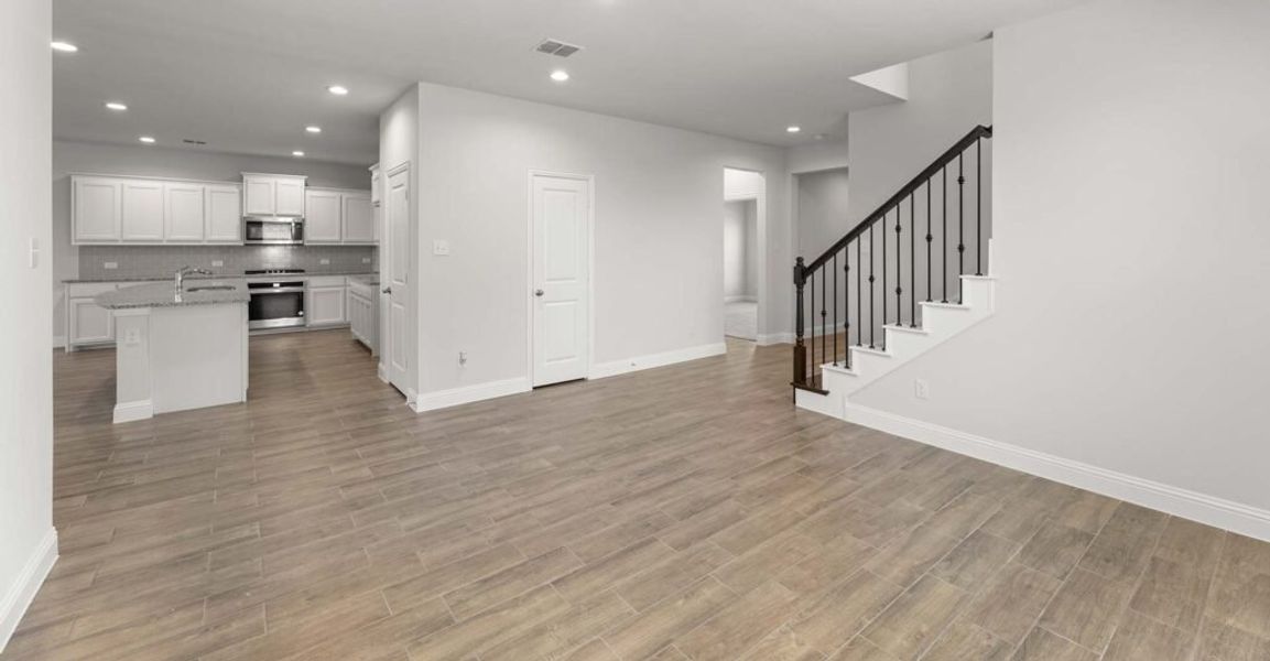 Representative exterior photo of a completed home built from the Goodrich by Impression Homes in Timberbrook, Justin, TX (Image 11).