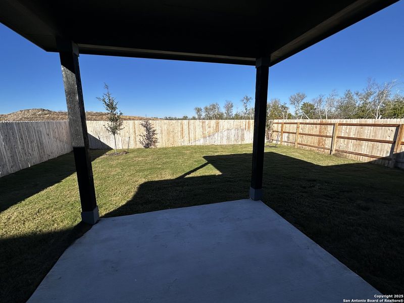 Exterior details and patio area of a home in Hennersby Hollow, San Antonio (Image 2).