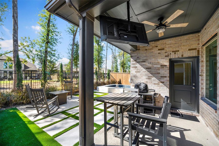 Exterior details and patio area of a home in The Highlands - Grove Collection, Porter (Image 24).