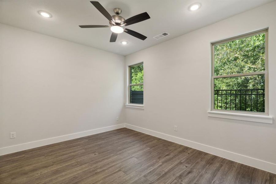 Primary Bedroom with recessed lighting