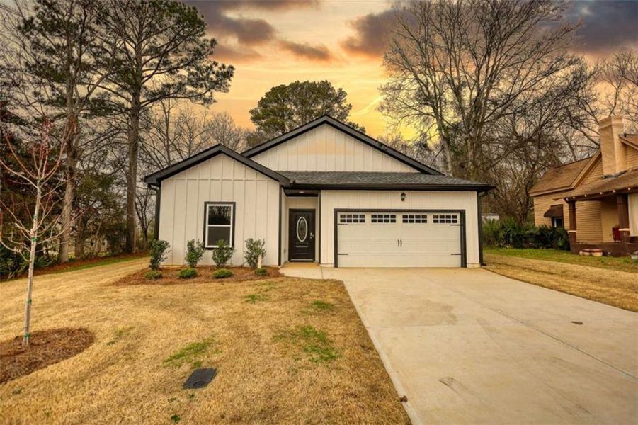 Front exterior of a new home in , Madison, GA, highlighting curb appeal (Image 2). Front exterior of a new home in , Madison, GA, highlighting curb appeal (Image 2).
