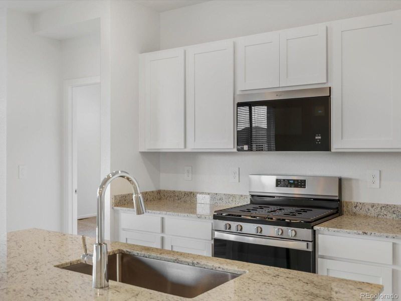Furnished interior view inside a new home in Buffalo Highlands: The Flora Collection, Commerce City (Image 5).