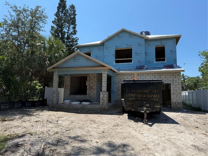 Front exterior of a new home in , St. Petersburg, FL, highlighting curb appeal (Image 13).