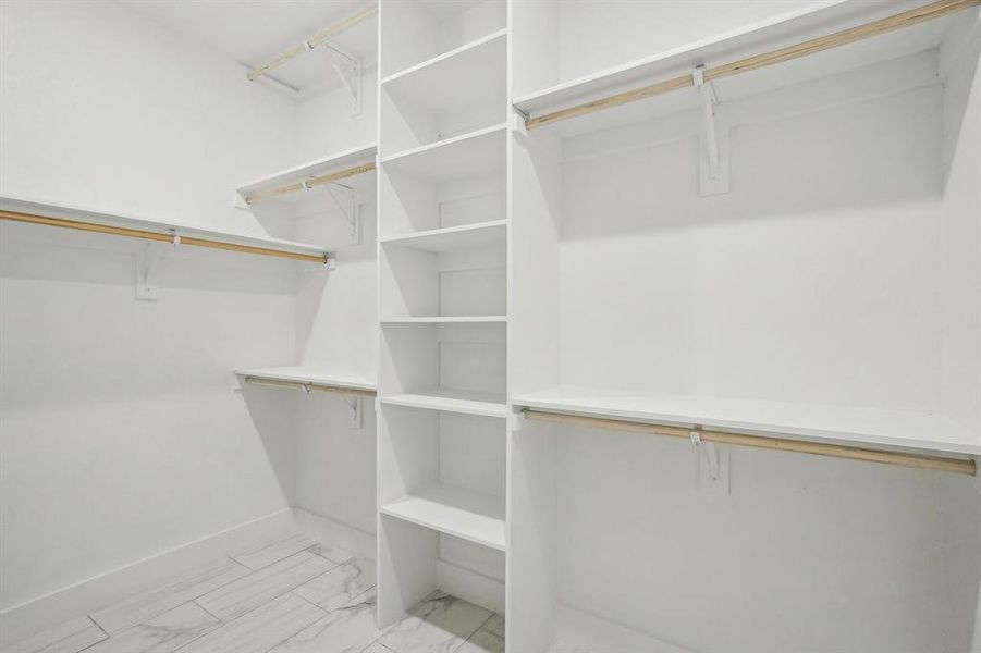 View of spacious custom closet