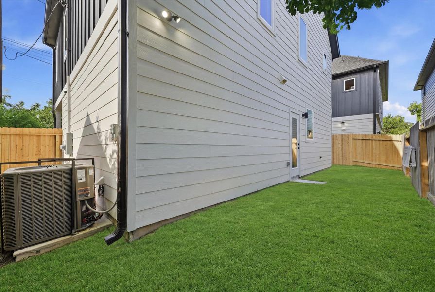 Exterior details and patio area of a home in , Houston (Image 4). Exterior details and patio area of a home in , Houston (Image 4).