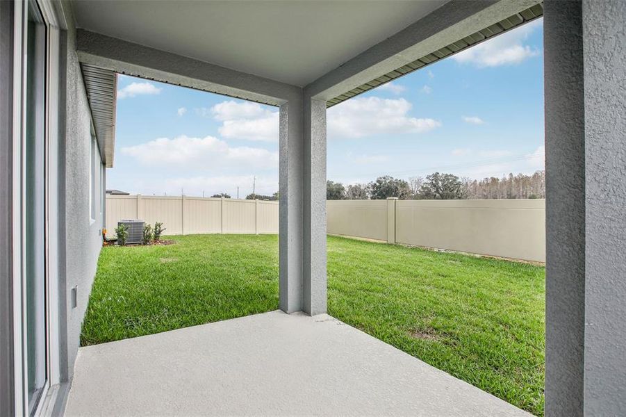 Exterior details and patio area of a home in Two Rivers - Classic Series, Zephyrhills (Image 23).