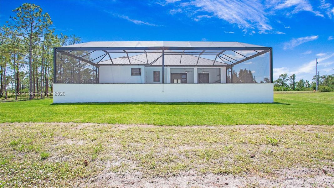 Exterior details and patio area of a home in , Naples (Image 39).