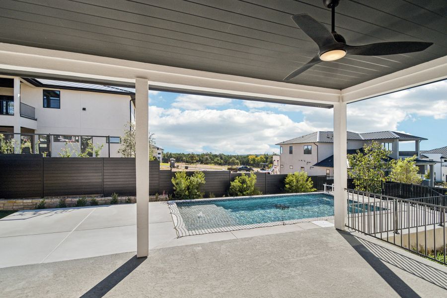Exterior details and patio area of a home in Milky Way at River Place, Austin (Image 4).