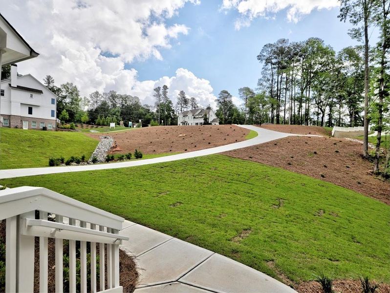 Front exterior of a new home in , Cumming, GA, highlighting curb appeal (Image 18). Front exterior of a new home in , Cumming, GA, highlighting curb appeal (Image 18).