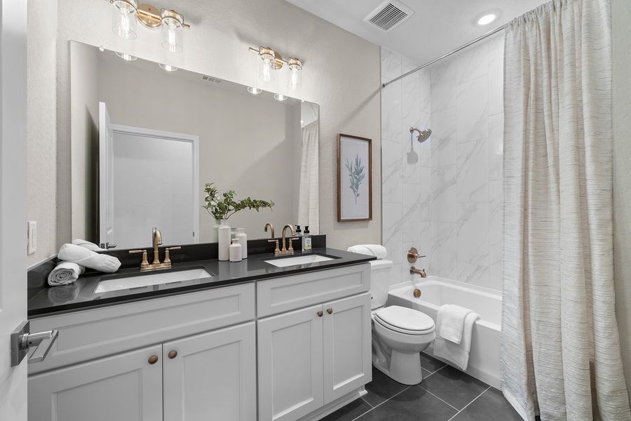 Representative furnished interior of a home built from the The Lancaster by Rosehaven Homes in Friedrich Hill, San Antonio (Image 41).