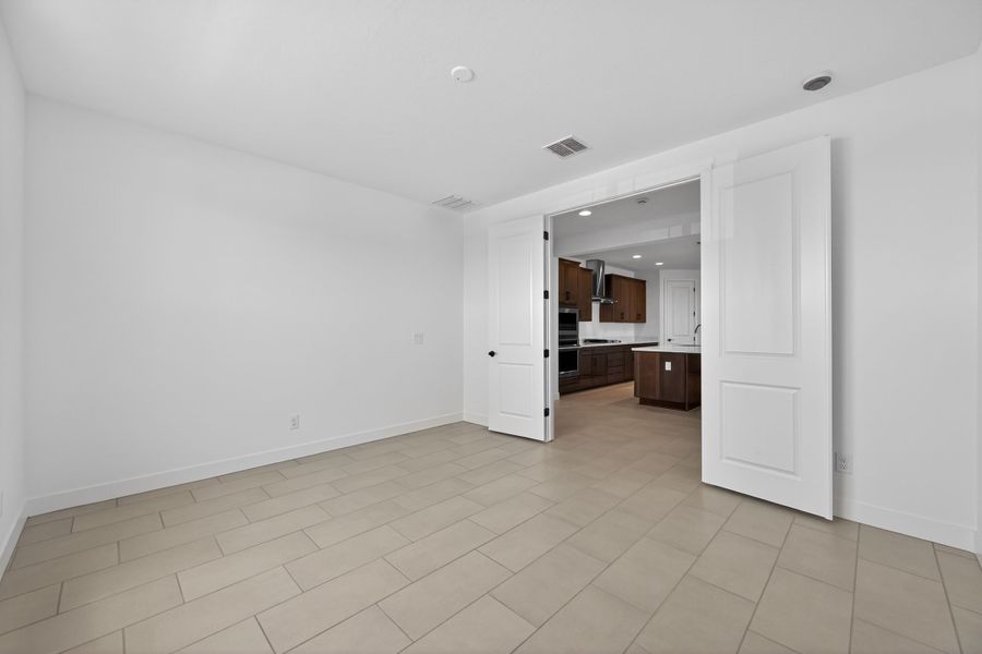 Spacious, unfurnished interior of a new home in Artisan at Asante, Surprise (Image 23).