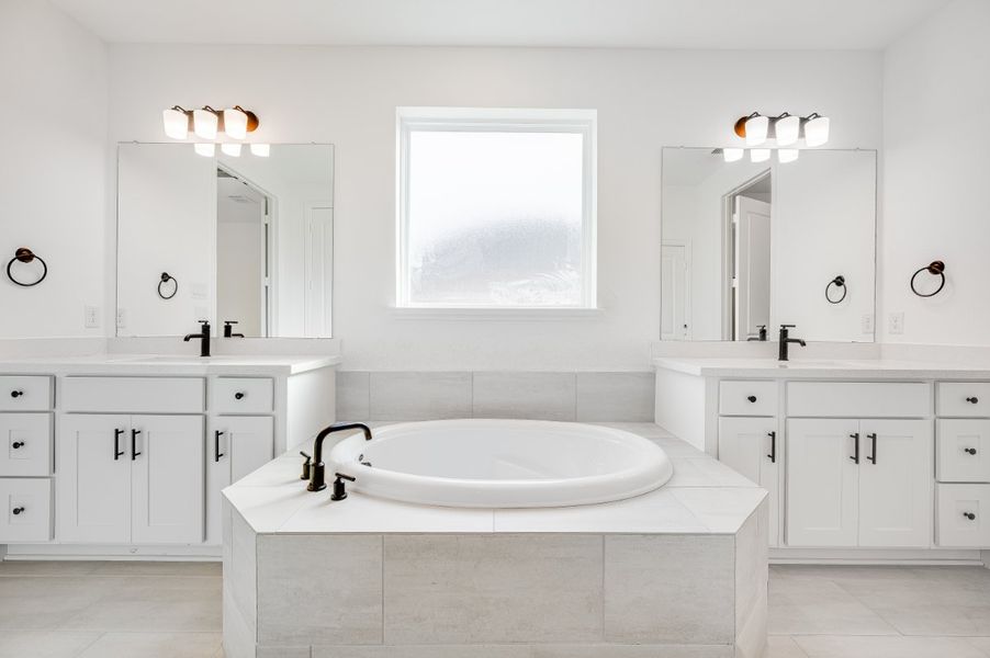 Representative furnished interior of a home built from the Sapphire by Taylor Morrison in Highland Lakes 60s, McKinney (Image 6).