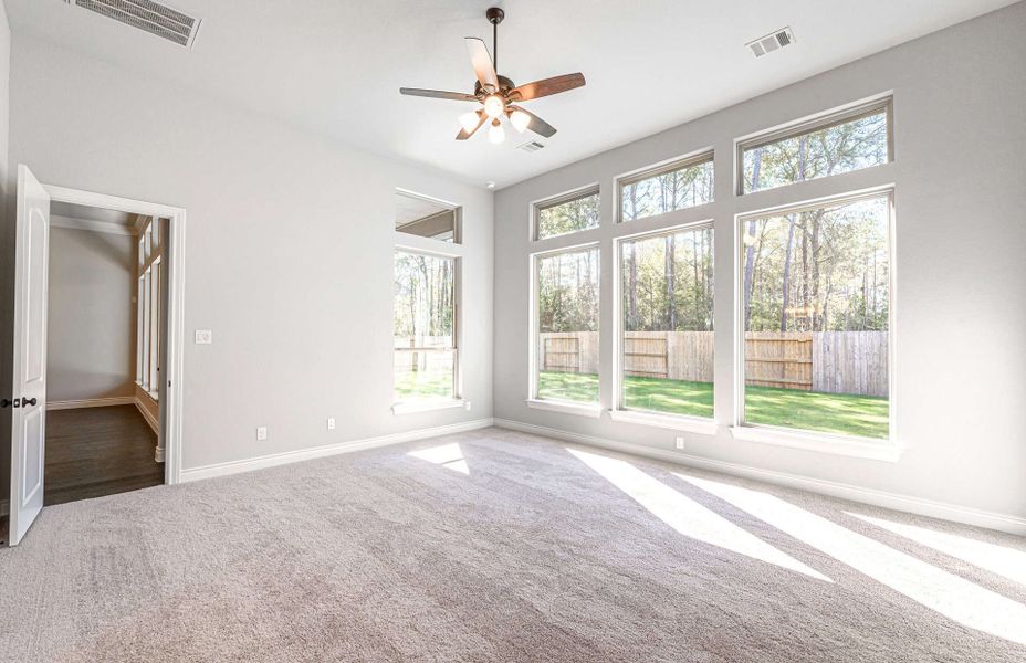 Representative unfurnished interior of a home built from the 3358 by Ravenna Homes in Artavia 70′, Conroe (Image 46).