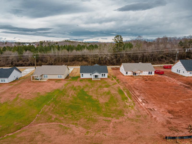 Site preparation for future homes built from the Saxon by Enchanted Homes in Guadalupe Heights, Seguin (Image 52).