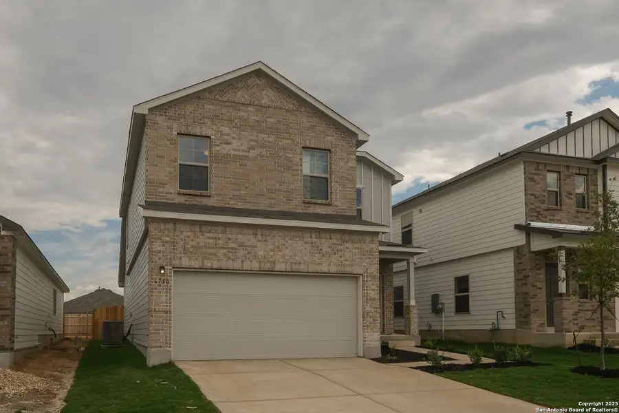 Front exterior of a new home in Winding Brook, San Antonio, TX, highlighting curb appeal (Image 1). Front exterior of a new home in Winding Brook, San Antonio, TX, highlighting curb appeal (Image 1).