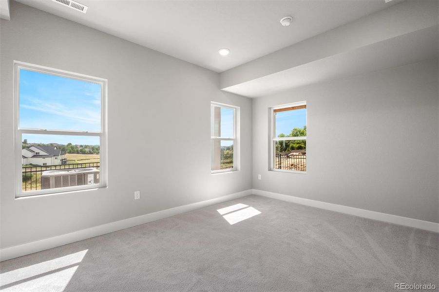 Spacious, unfurnished interior of a new home in Trailside at Cottonwood Creek, Colorado Springs (Image 19).