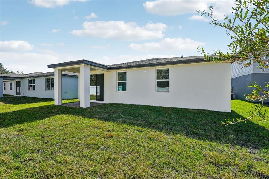 Exterior details and patio area of a home in Fox Pointe at Rivers Edge, Leesburg (Image 2).