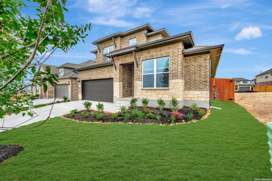 Front exterior of a new home in , New Braunfels, TX, highlighting curb appeal (Image 2). Front exterior of a new home in , New Braunfels, TX, highlighting curb appeal (Image 2).