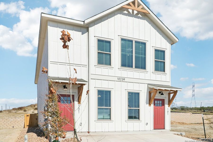Front exterior of a new home in Magnolia Village, San Antonio, TX, highlighting curb appeal (Image 27). Front exterior of a new home in Magnolia Village, San Antonio, TX, highlighting curb appeal (Image 27).