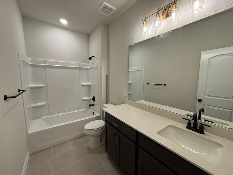 Furnished interior view inside a new home in Cannon Ranch 45s, Dripping Springs (Image 10).