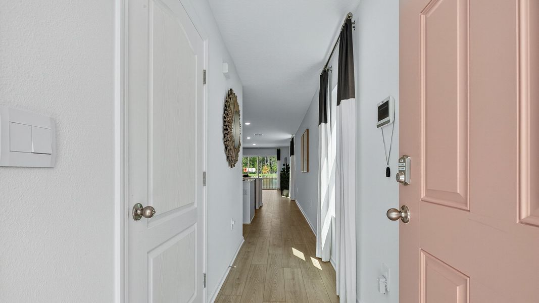 Representative furnished interior of a home built from the CARSON by D.R. Horton in Trout River, Jacksonville (Image 3).