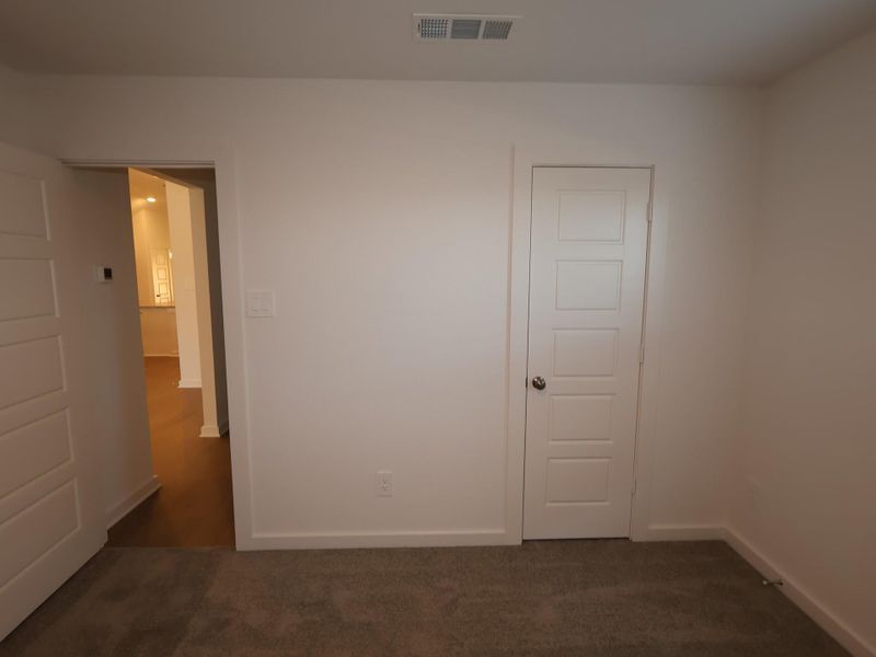 Spacious, unfurnished interior of a new home in Pinewood at Grand Texas, New Caney (Image 6).