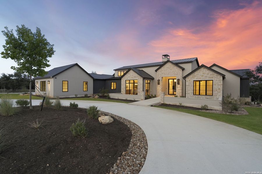 Front exterior of a new home in , Spring Branch, TX, highlighting curb appeal (Image 24).