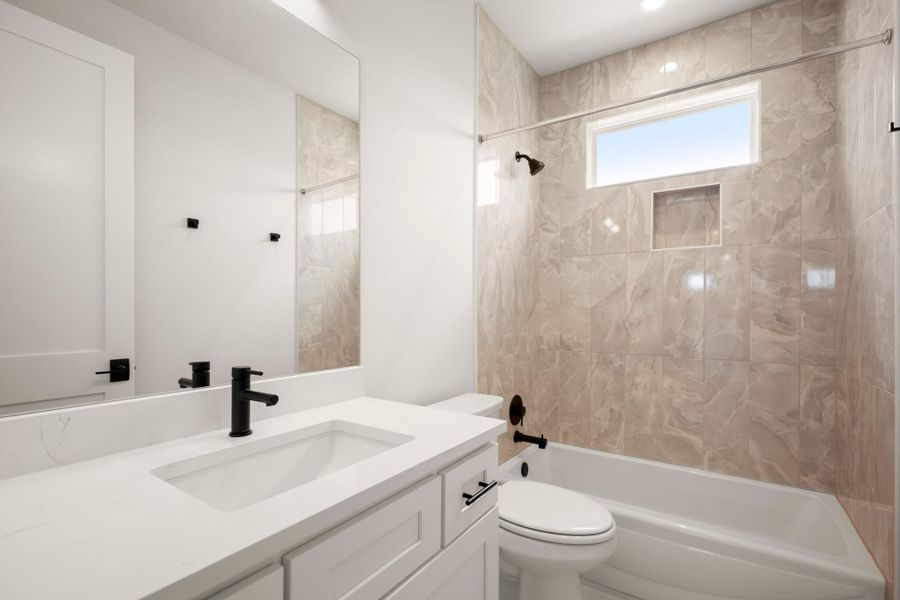 Bathroom with vanity and shower / tub combination Bathroom with vanity and shower / tub combination