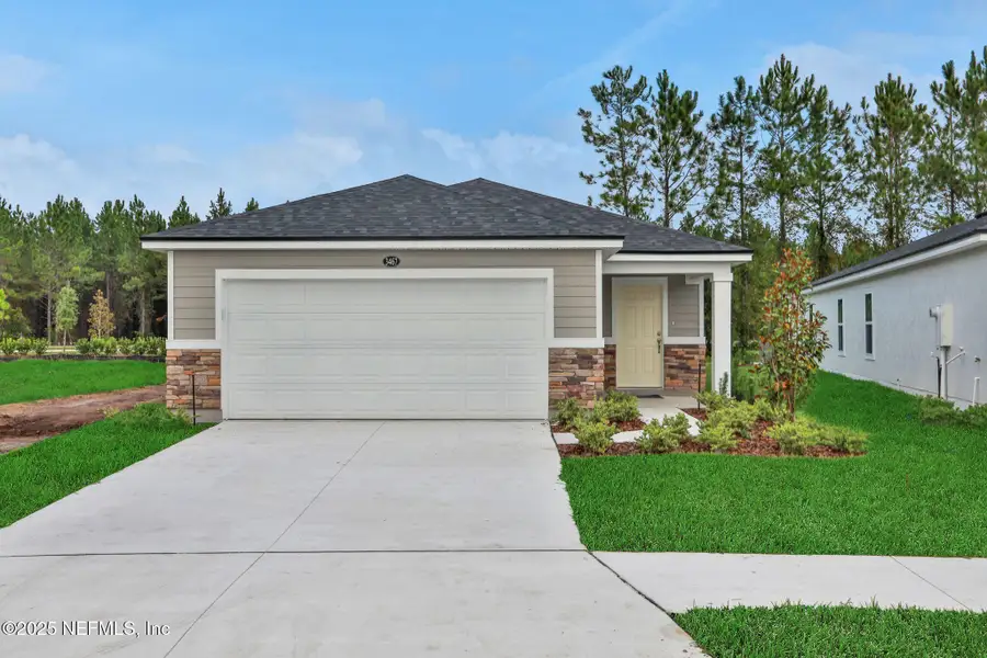 Front exterior of a new home in , Green Cove Springs, FL, highlighting curb appeal (Image 1). Front exterior of a new home in , Green Cove Springs, FL, highlighting curb appeal (Image 1).
