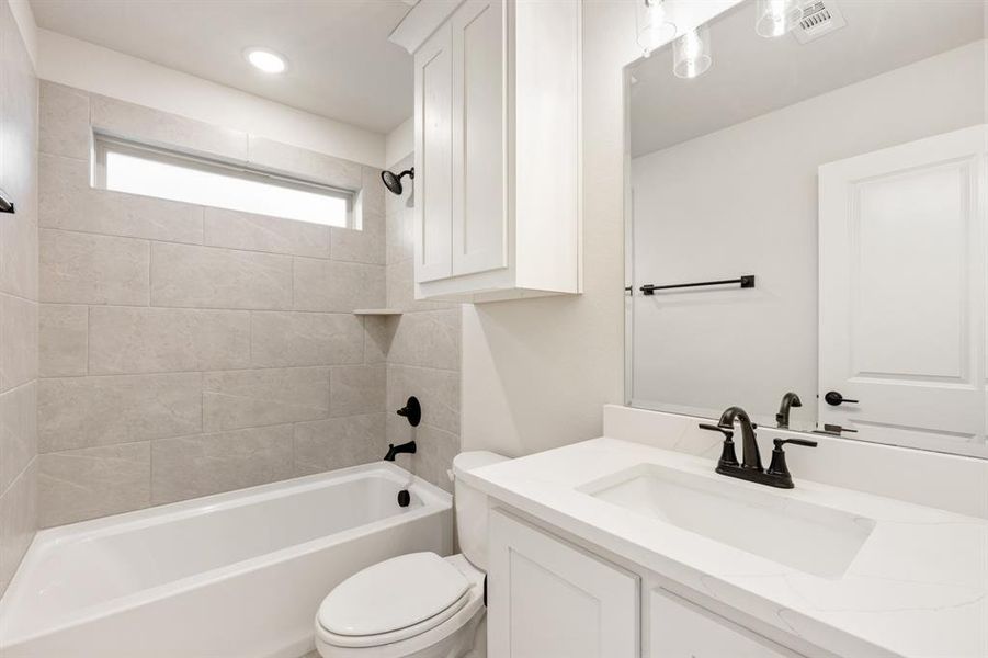 Furnished interior view inside a new home in Villages of Hurricane Creek, Anna (Image 10).