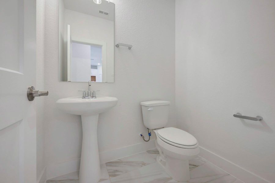 Furnished interior view inside a new home in Sorella, Tomball (Image 12).