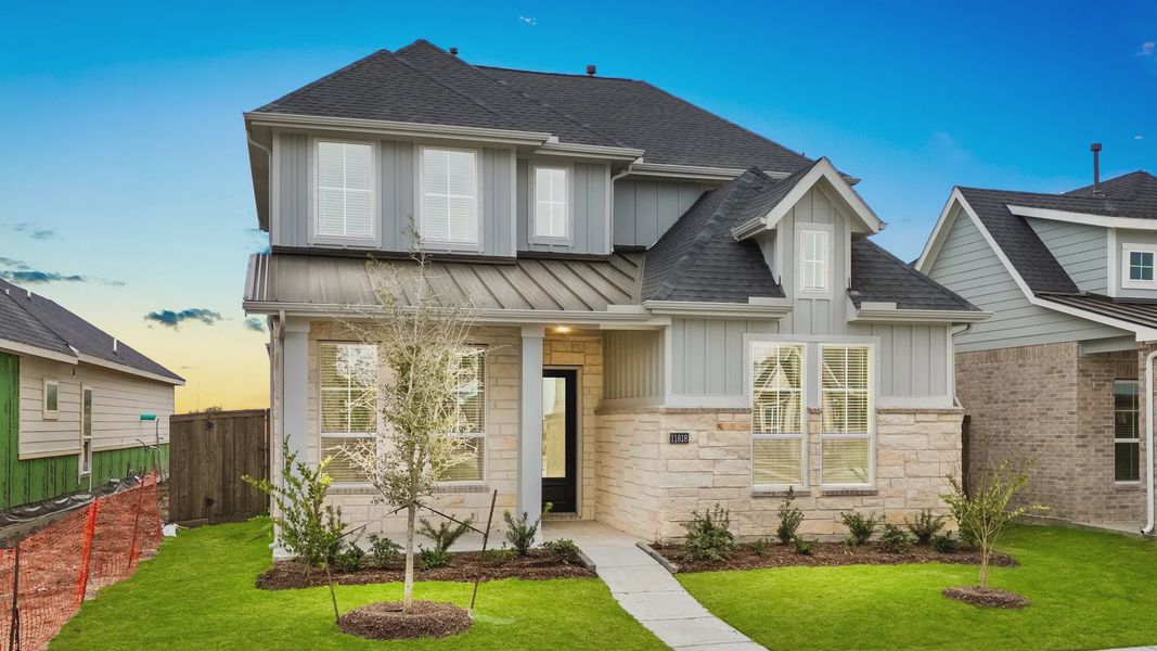 Representative exterior photo of a completed home built from the St Andrews by Chesmar Homes in Riceland Alley Loads, Mont Belvieu, TX (Image 31).