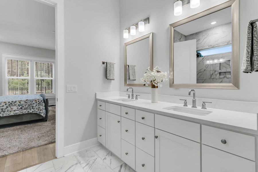 Furnished interior view inside a new home in K. Hovnanian's® Four Seasons at Lakes of Cane Bay, Summerville (Image 32).