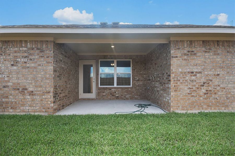 Exterior details and patio area of a home in Kiber Reserve, Angleton (Image 13). Exterior details and patio area of a home in Kiber Reserve, Angleton (Image 13).