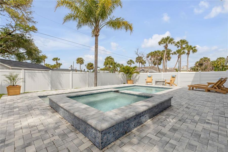 Exterior details and patio area of a home in , New Smyrna Beach (Image 31).