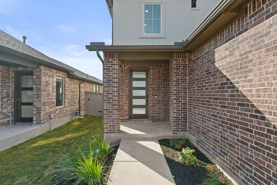 Exterior details and patio area of a home in Flora, Hutto (Image 2).