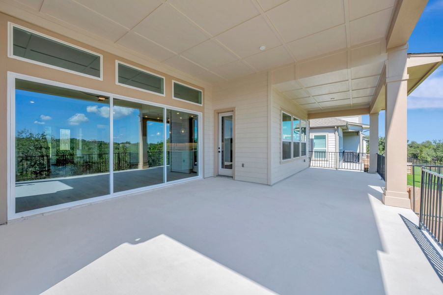 Exterior details and patio area of a home in Headwaters 80' - Executive Series, Dripping Springs (Image 3). Exterior details and patio area of a home in Headwaters 80' - Executive Series, Dripping Springs (Image 3).