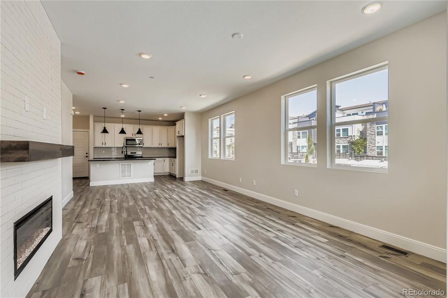 Living & dining w/ walls of windows Living & dining w/ walls of windows