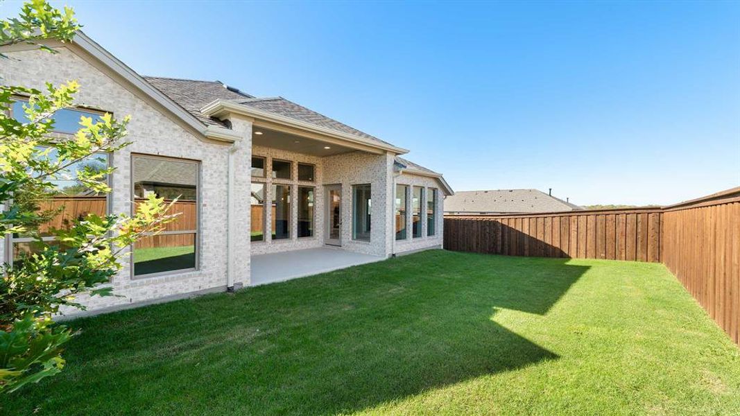 Exterior details and patio area of a home in Hillstead 50', Lavon (Image 3).