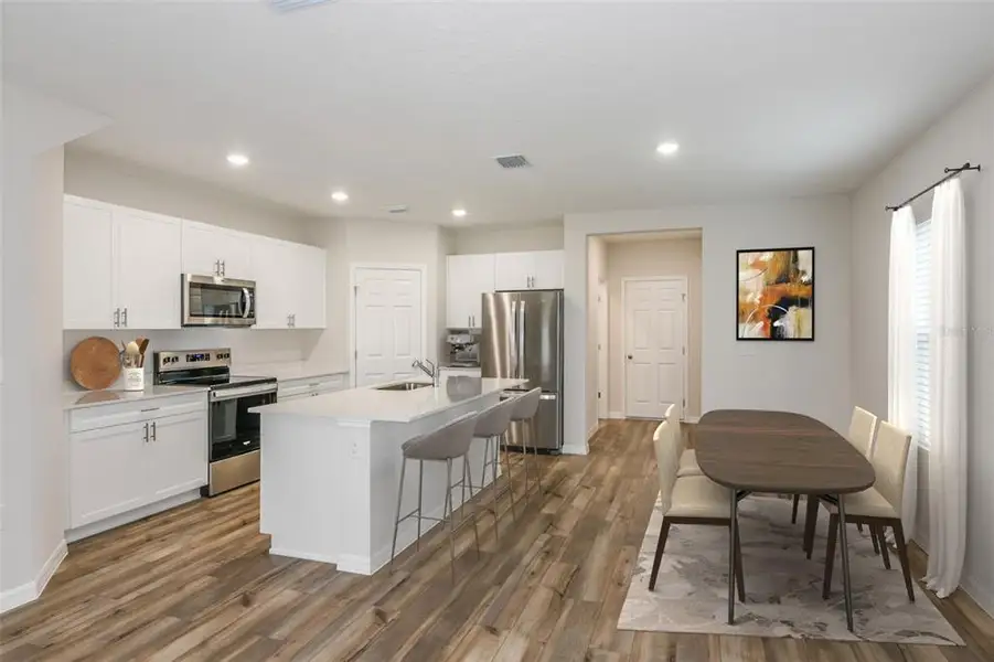 Furnished interior view inside a new home in Pasadena Woods, Dade City (Image 3).