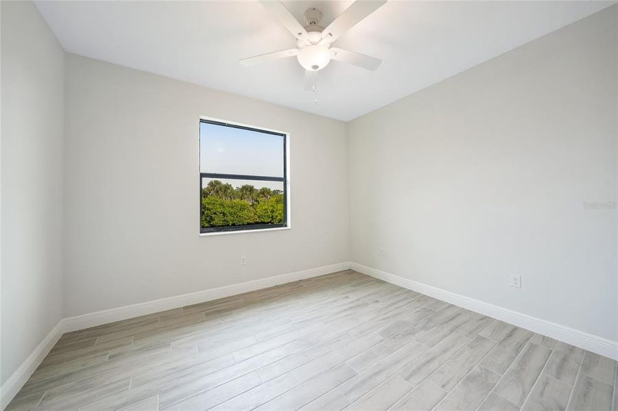 Spacious, unfurnished interior of a new home in , Port Charlotte (Image 34).