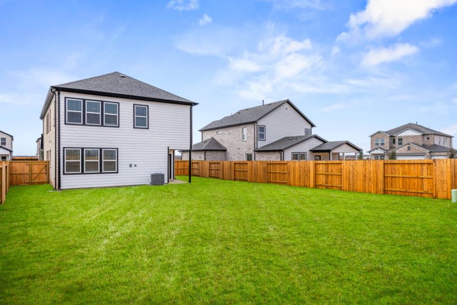 Exterior details and patio area of a home in Creekhaven, Arcola (Image 19).