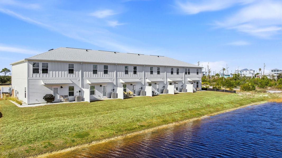 Exterior details and patio area of a home in WindMark Beach, Port Saint Joe (Image 24).