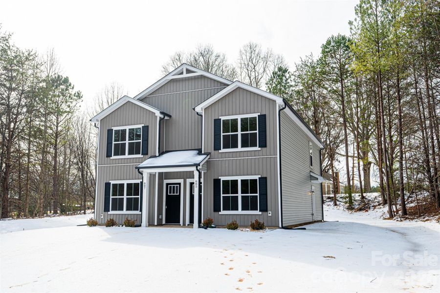 Front exterior of a new home in , Newton, NC, highlighting curb appeal (Image 1). Front exterior of a new home in , Newton, NC, highlighting curb appeal (Image 1).