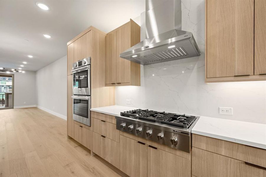 Top of the line appliances are waiting for you in this chef's kitchen!